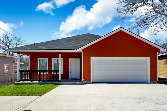 ranch-style house with covered porch and a garage