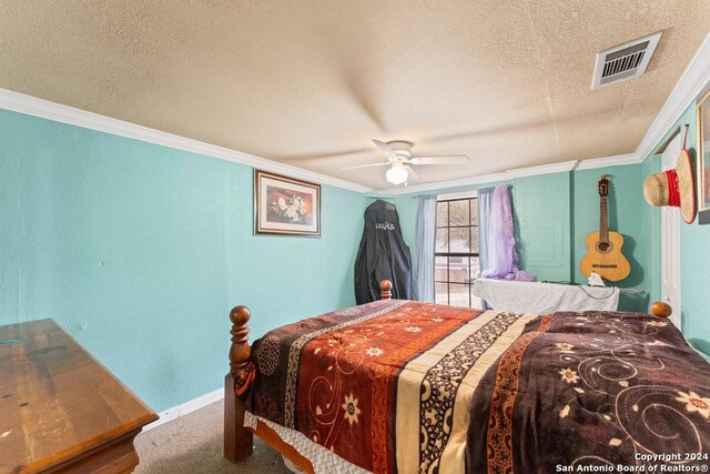22620 Little Walnut Dr, San Antonio, TX 78264 - carpeted bedroom with a textured ceiling, ornamental molding, baseboards, and a ceiling fan