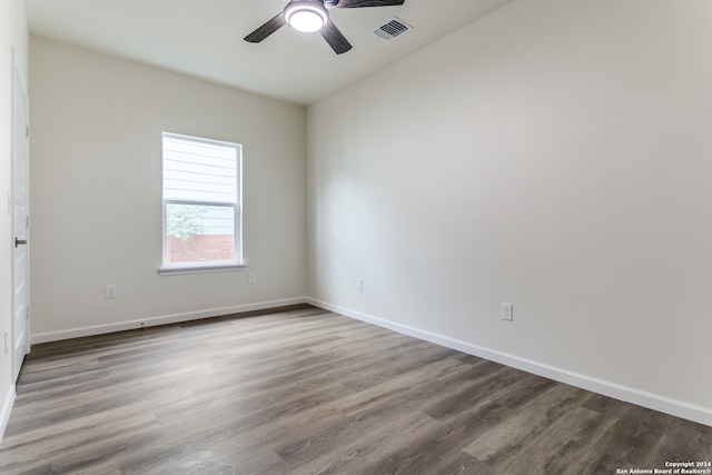 unfurnished room featuring hardwood / wood-style floors and ceiling fan