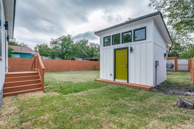 view of outdoor structure with a yard