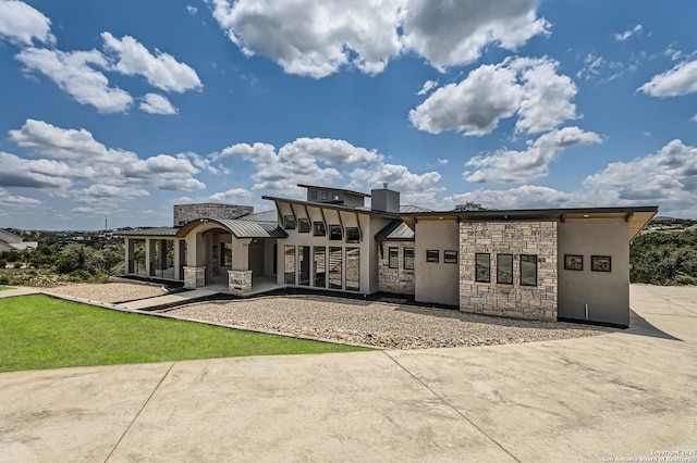 23202 Walker Rdg, San Antonio, TX 78255 - contemporary home with stone siding and stucco siding