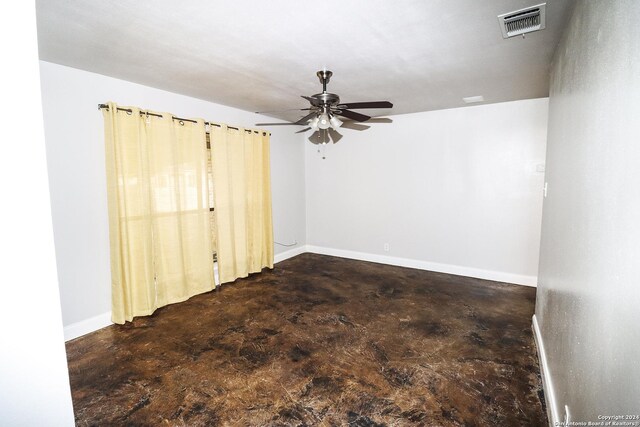 7227 Trace Buckle, San Antonio, TX 78240 - unfurnished room with a ceiling fan, concrete floors, and baseboards