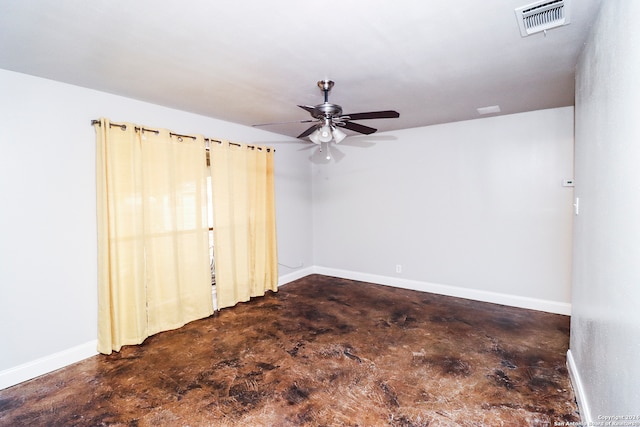 spare room with ceiling fan