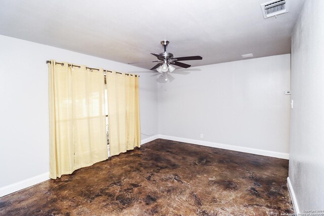 7227 Trace Buckle, San Antonio, TX 78240 - spare room featuring ceiling fan, concrete floors, and baseboards