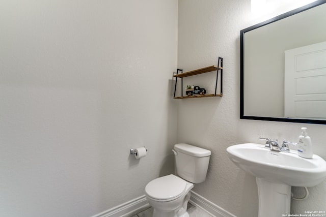 bathroom featuring toilet