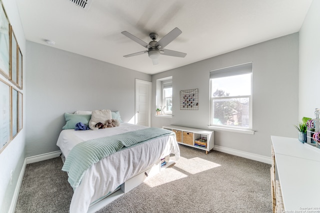 carpeted bedroom featuring ceiling fan