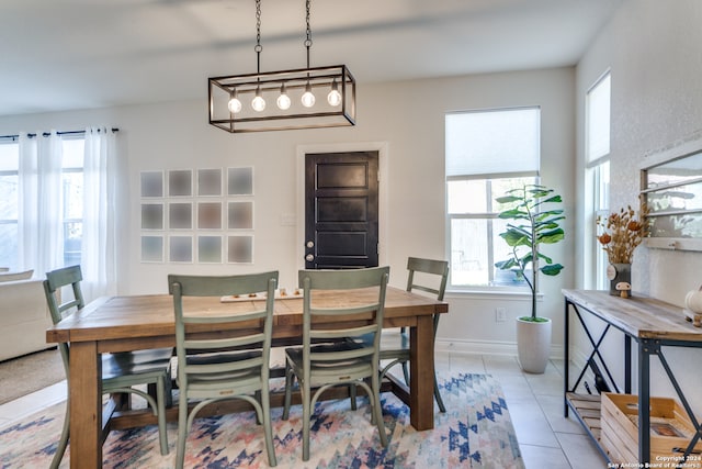 dining room with light tile patterned floors