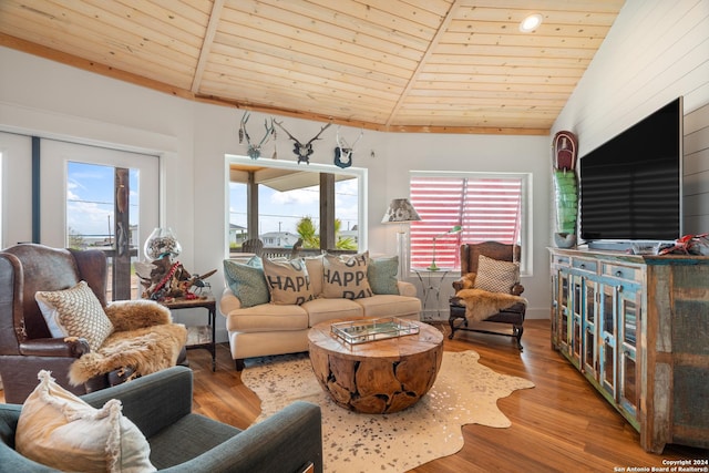 1517 S Magnolia St, Rockport, TX 78382 - living area with wood ceiling, lofted ceiling, and wood finished floors