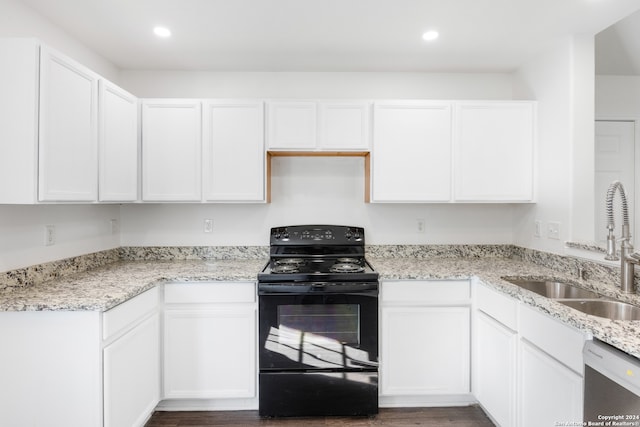 kitchen with sink, white cabinets, stainless steel dishwasher, and black range with electric cooktop