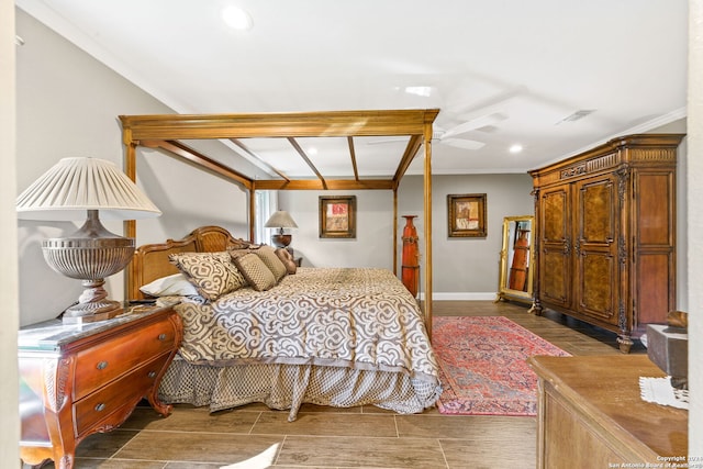 bedroom with ceiling fan, dark hardwood / wood-style flooring, and ornamental molding