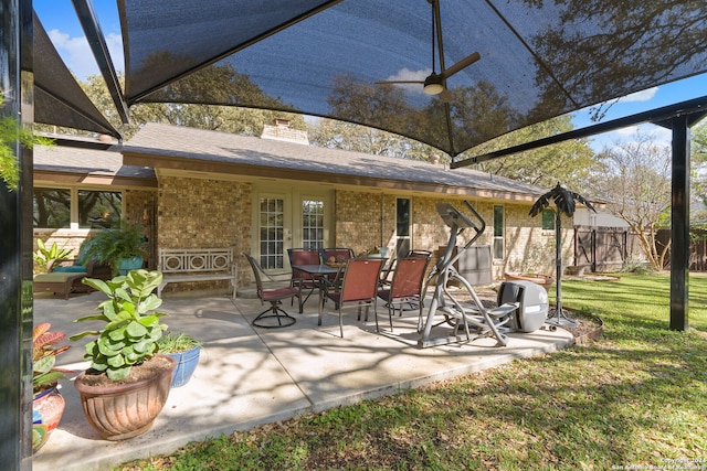 view of patio featuring french doors and ceiling fan