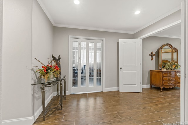 interior space featuring crown molding and dark hardwood / wood-style flooring