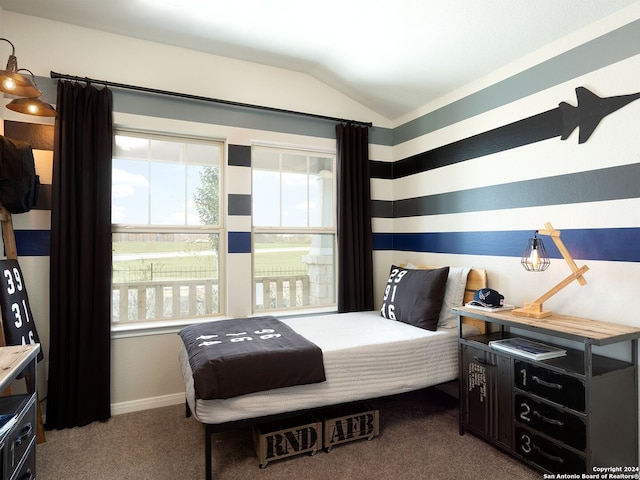 bedroom featuring vaulted ceiling, carpet flooring, and baseboards