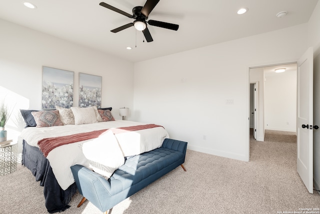 carpeted bedroom with ceiling fan