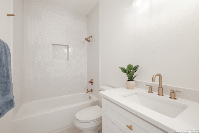 full bathroom with vanity, toilet, and tiled shower / bath combo