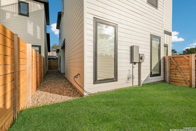 view of home's exterior featuring a lawn