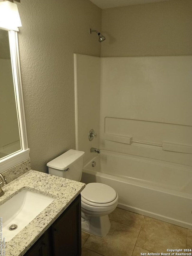 full bathroom featuring tile patterned floors, shower / tub combination, vanity, and toilet