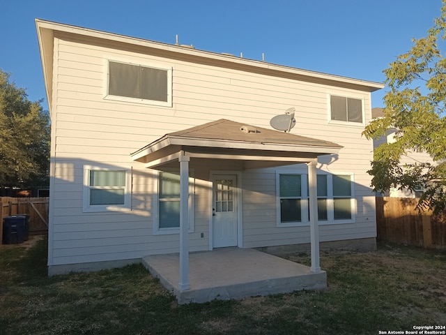 rear view of property with a patio area