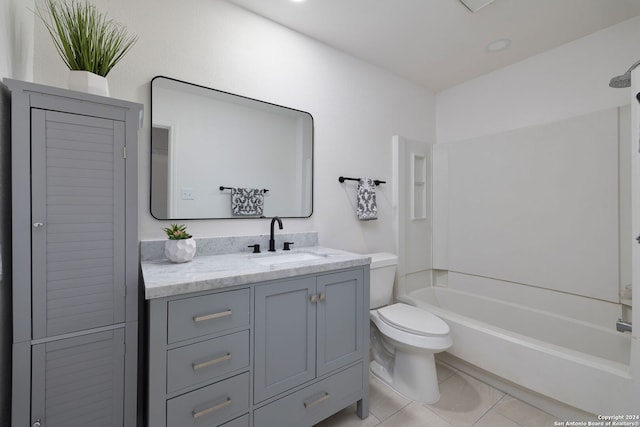 full bathroom with tile patterned flooring, vanity, bathtub / shower combination, and toilet