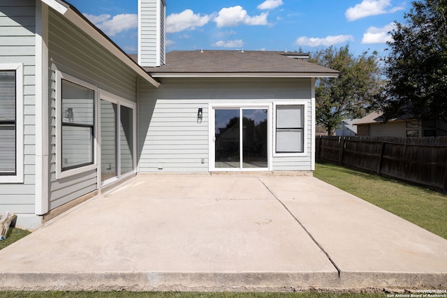 exterior space with a lawn and a patio area