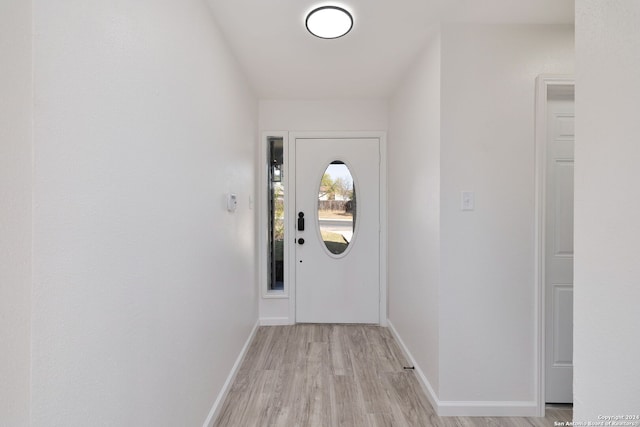 doorway to outside featuring light hardwood / wood-style floors