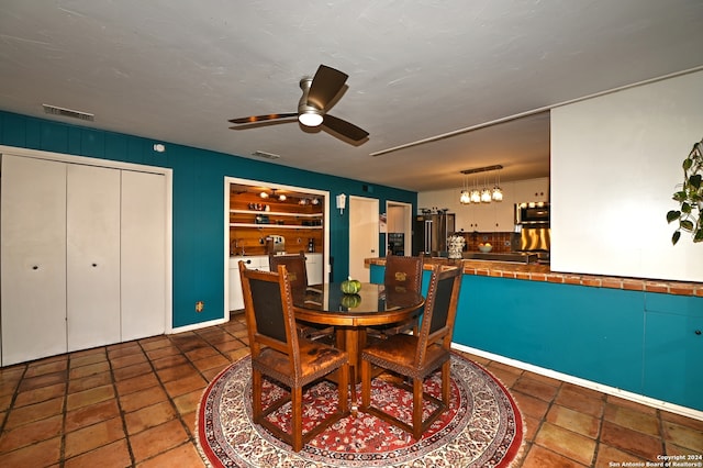 dining room with ceiling fan