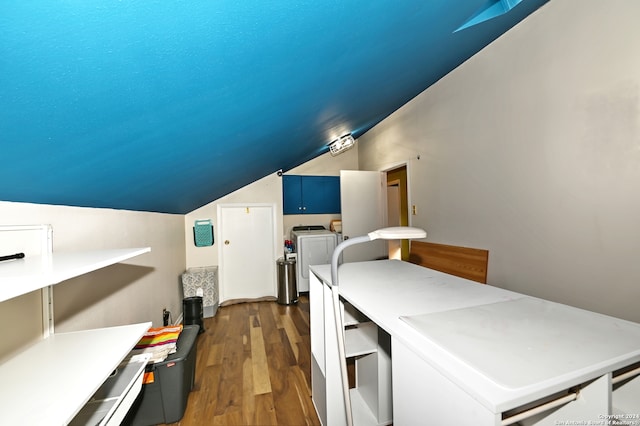 interior space featuring cabinets, dark hardwood / wood-style floors, and independent washer and dryer