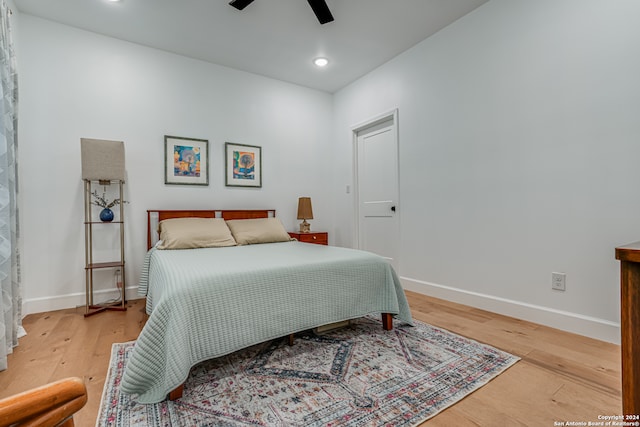 bedroom featuring ceiling fan and light wood-type flooring