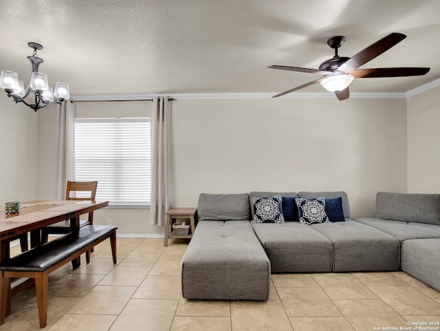 tiled living room featuring a textured ceiling, ceiling fan with notable chandelier, and ornamental molding