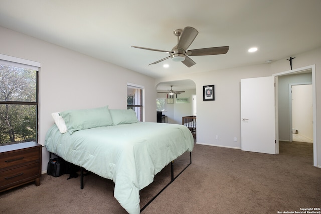 carpeted bedroom featuring ceiling fan