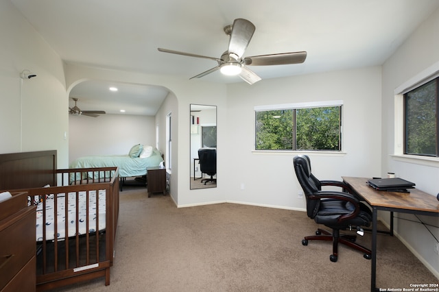 carpeted bedroom featuring ceiling fan