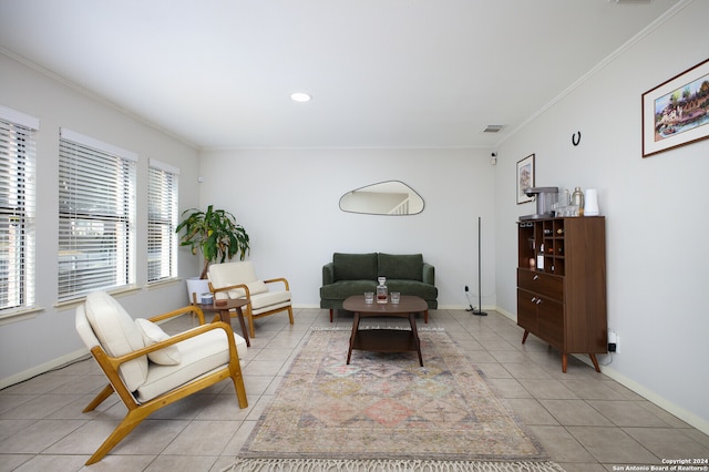 living room featuring crown molding and light tile patterned flooring