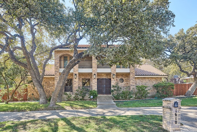 view of front of home with a front yard