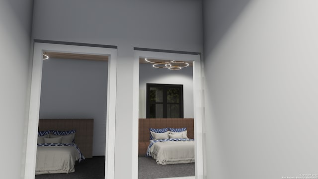 341 Avondale Ave, San Antonio, TX 78223 - bedroom featuring carpet flooring and a chandelier