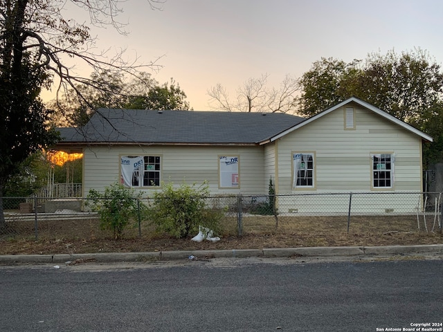 view of property exterior at dusk