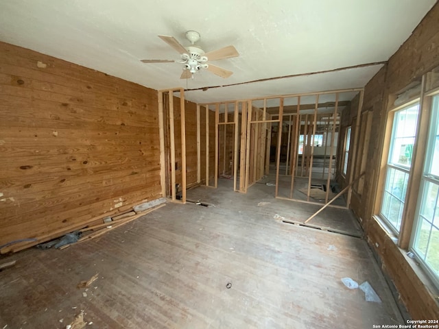 misc room with ceiling fan and a wealth of natural light