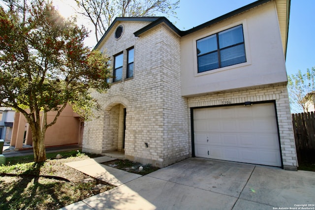 view of front of property featuring a garage