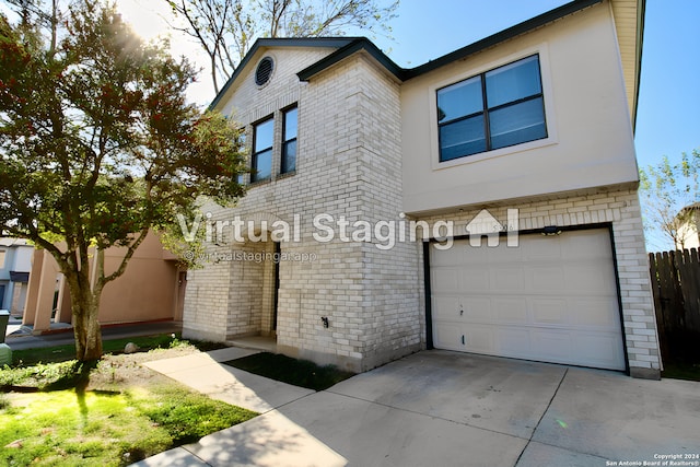 view of front of home with a garage