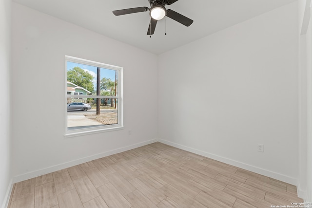 unfurnished room with ceiling fan