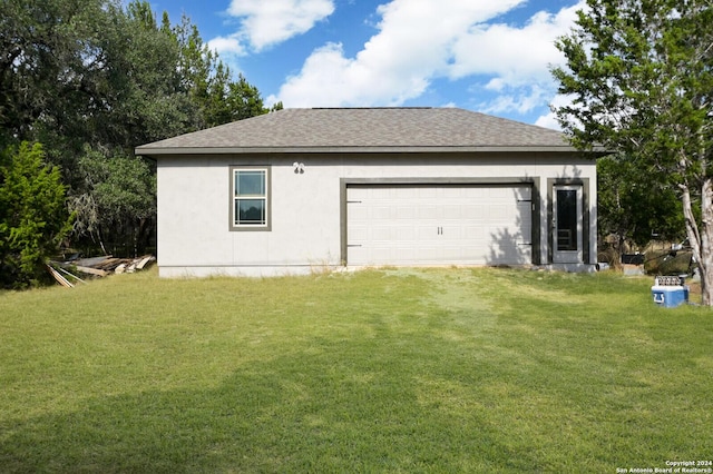 2407 Fm 1283, Pipe Creek, TX 78063 - view of side of property with a shingled roof, a yard, and stucco siding