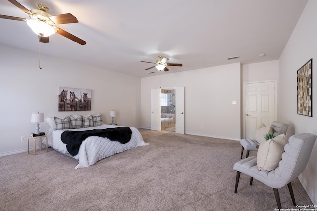 carpeted bedroom featuring baseboards, a ceiling fan, and ensuite bath