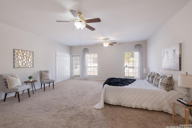 bedroom with carpet flooring, baseboards, and ceiling fan