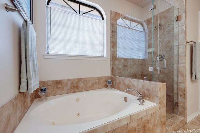 bathroom with independent shower and bath