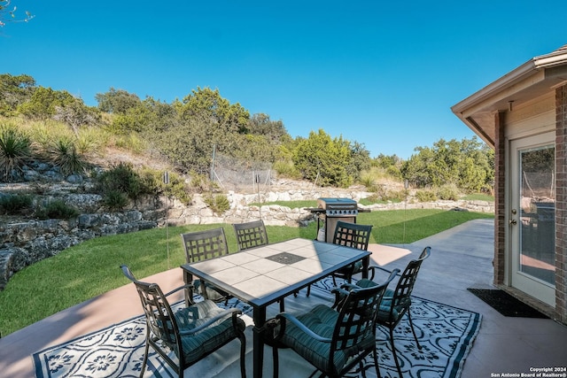 view of patio featuring outdoor dining area and area for grilling