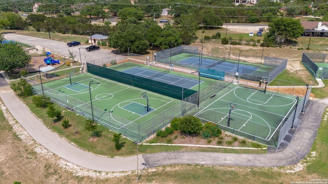 view of basketball court featuring tennis court