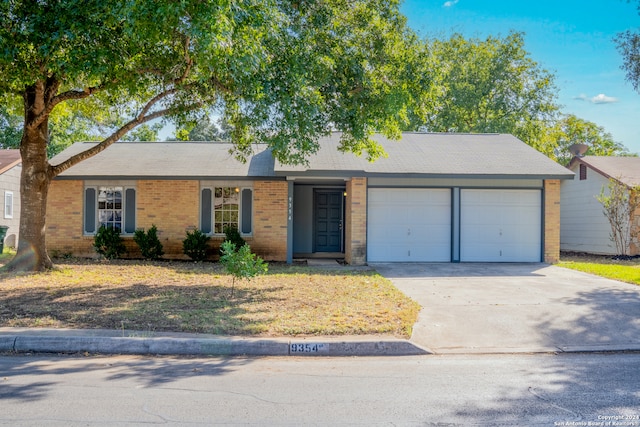 single story home featuring a garage