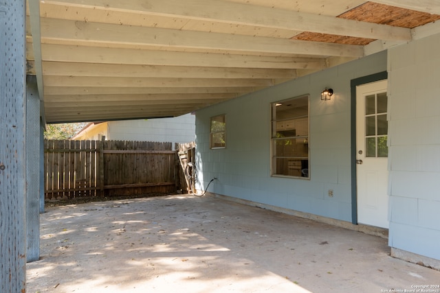 view of patio featuring a carport