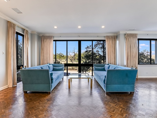 living room with dark parquet flooring and ornamental molding