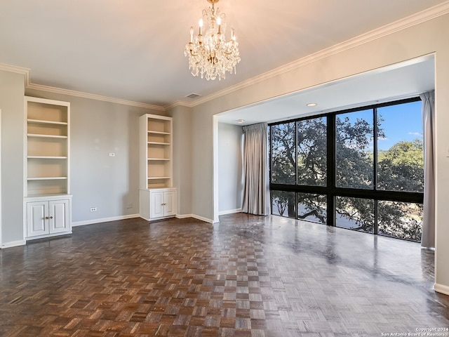 unfurnished living room with a chandelier, dark parquet flooring, built in features, and ornamental molding