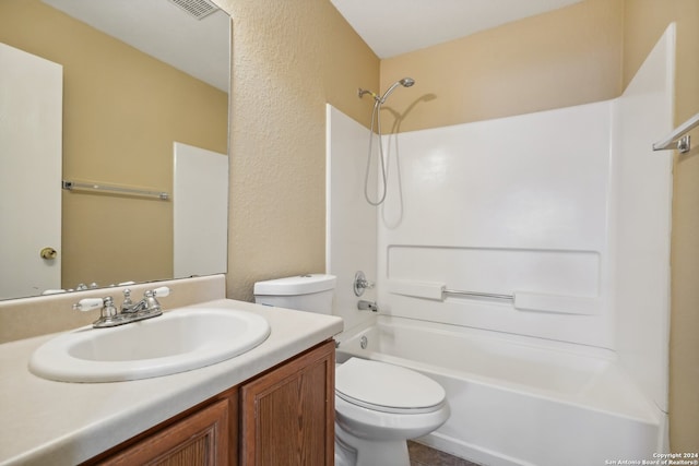 full bathroom featuring vanity, toilet, and bathing tub / shower combination